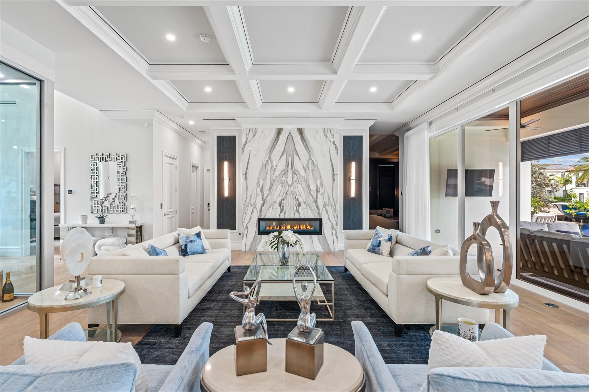 Main living room, great for relaxing nights by your gas, indoor fire place overlooking the water or for nights entertaining guests.