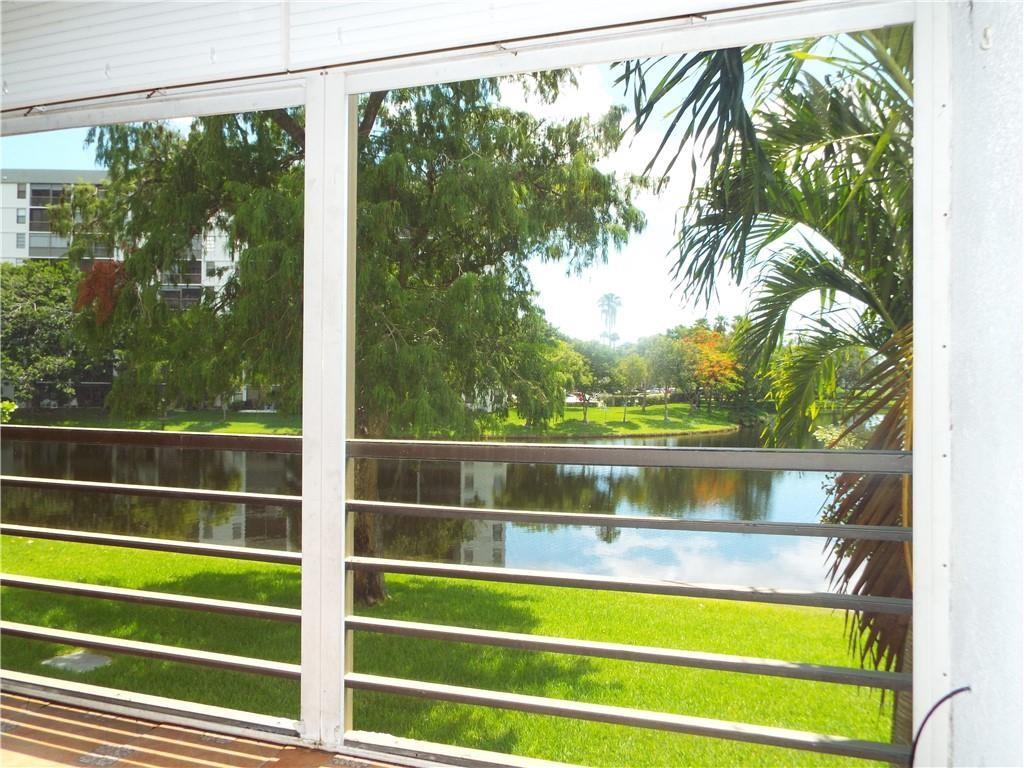 Photo for 2311 S Cypress Bend Drive, 219A, Pompano Beach, FL 33069 - Listing #FX-10412204 of the beautiful water from both bedrooms & Living room