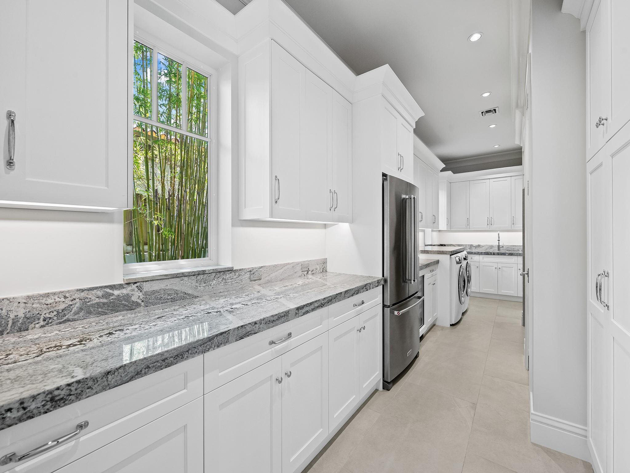 Laundry and pantry with exceptional storage
