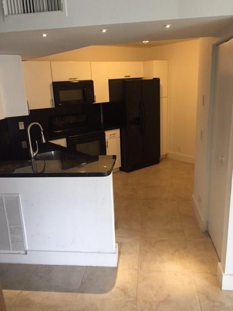 8761 Wiles Road 103, Coral Springs, FL 33067