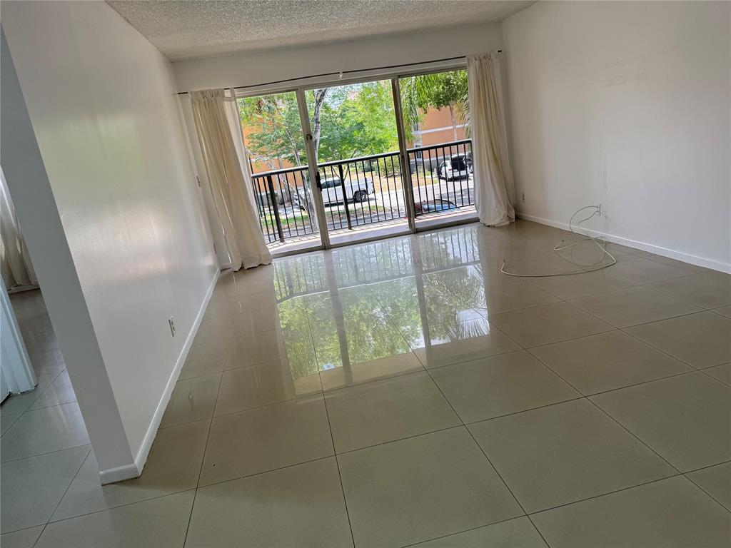 Photo for 8801 Wiles Road, 203, Coral Springs, FL 33067 - listing #FX-10446777 8801 Wiles Road, 203, Coral Springs, FL 33067