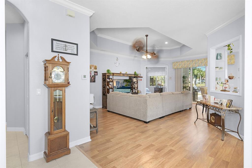 Photo for 6556 SE Broadmoor Lane, Stuart, FL 34997 - Listing #FX-10436197 TRAY CEILING IN THE LIVING ROOM WITH A BEAUTIFUL FAN