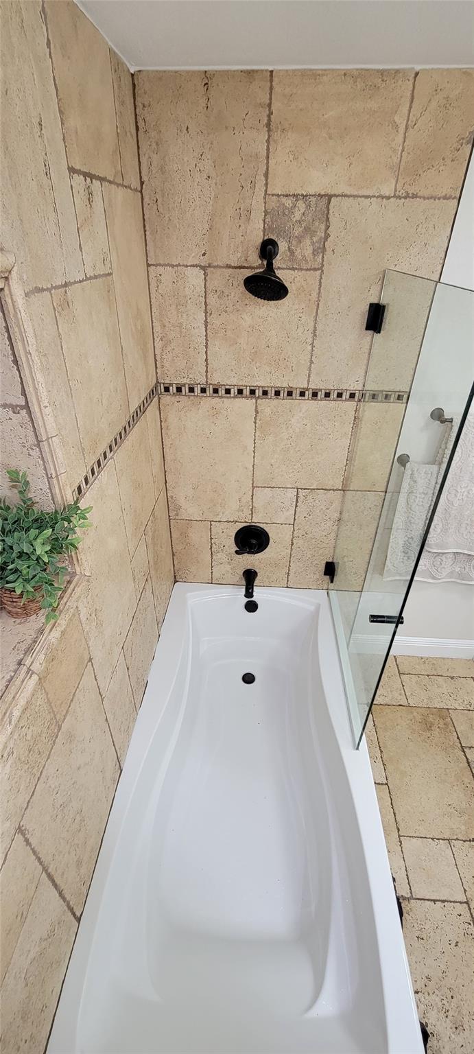 Updated Second bathroom featuring modern fixtures and finishes