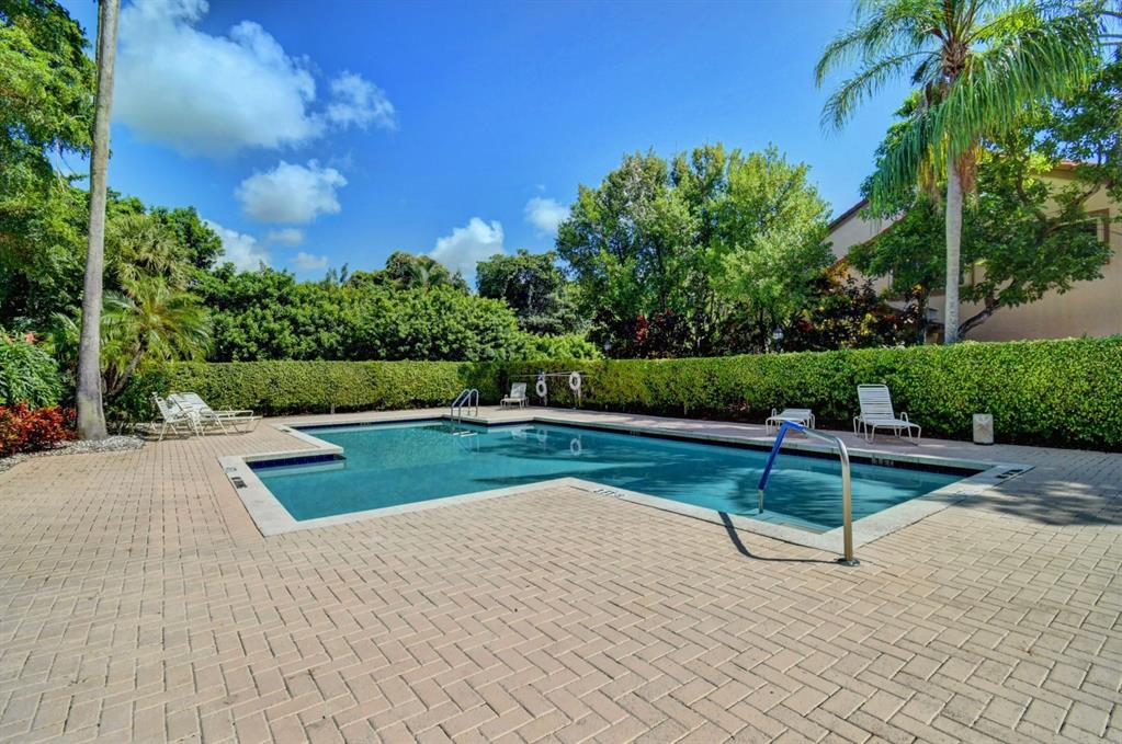 Photo for 5801 Coach House Circle, Unit E, Boca Raton, FL 33486 - Listing #FX-10436780 Take a dip in the sparkling community pool.