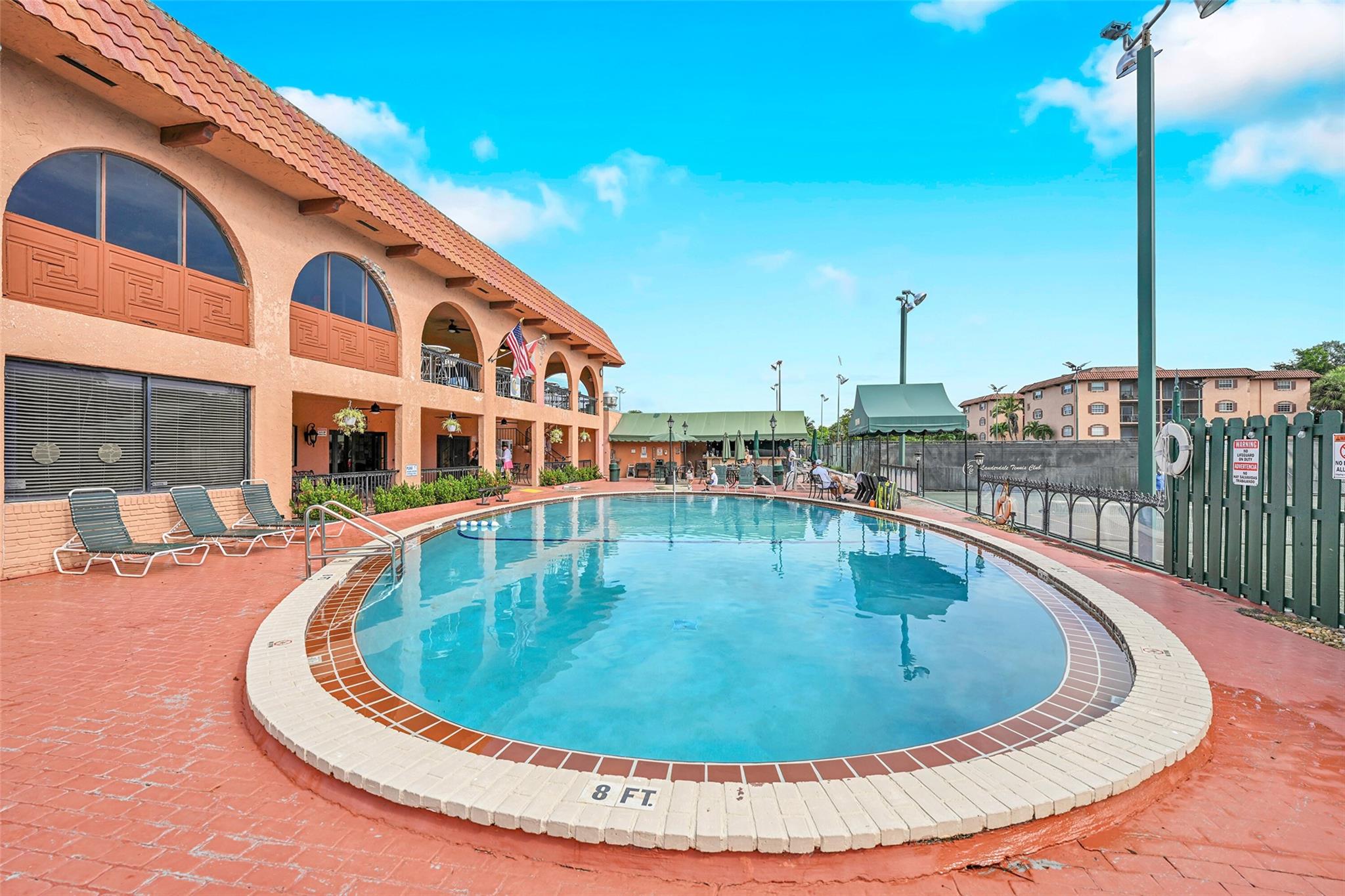 Pool next to 2-storey Clubhouse