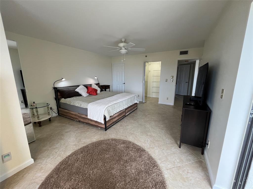 Spacious primary bedroom with 2 walk-in closets.