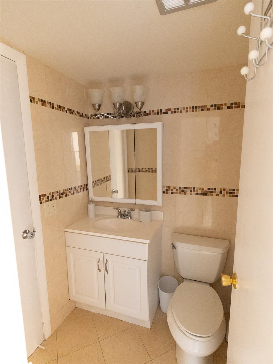 Half bathroom on your left once you enter the home.