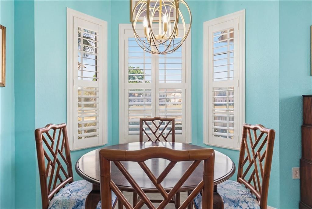 Dining area featuring hanging lights