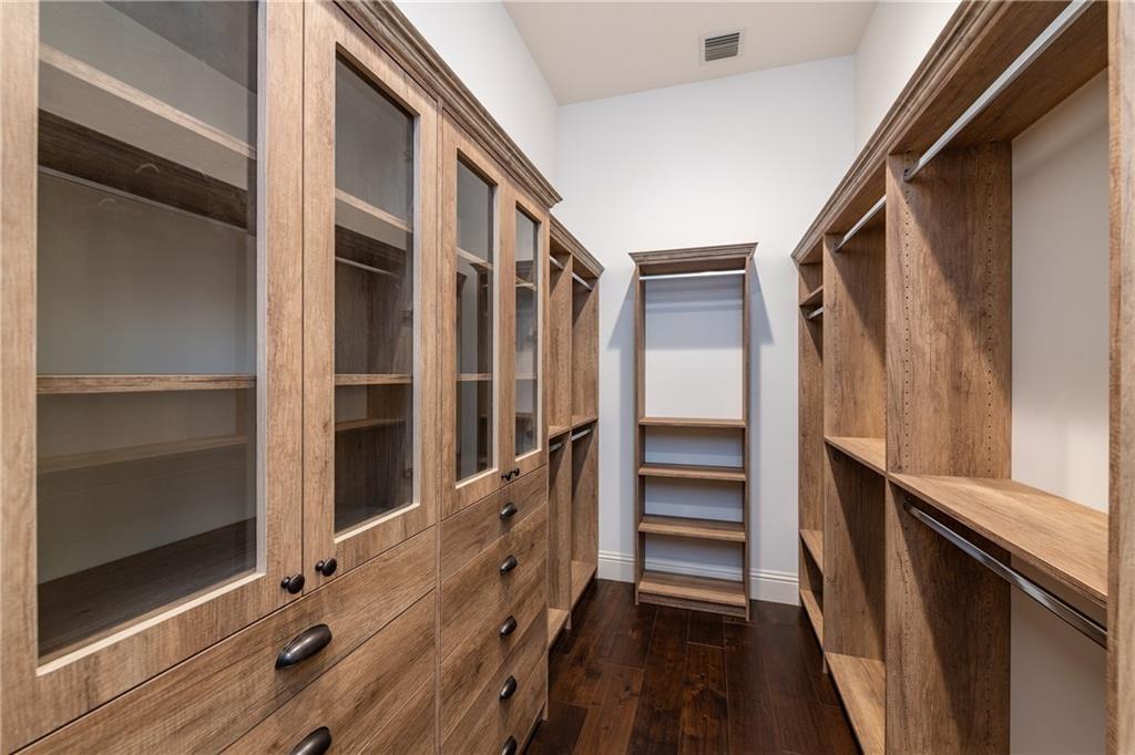 WALK-IN CLOSET IN MASTER BEDROOM