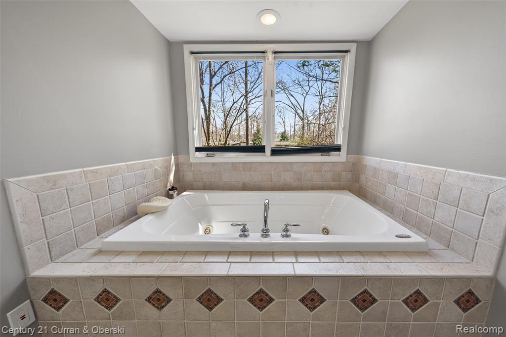Bathroom featuring a whirlpool tub