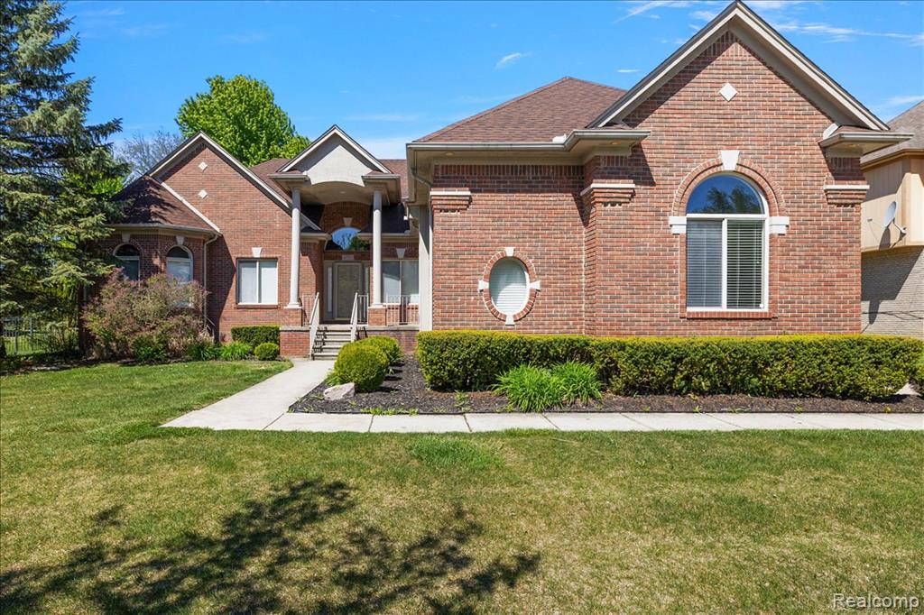 49763 Decker Drive, Shelby Twp, MI 48317 — front exterior