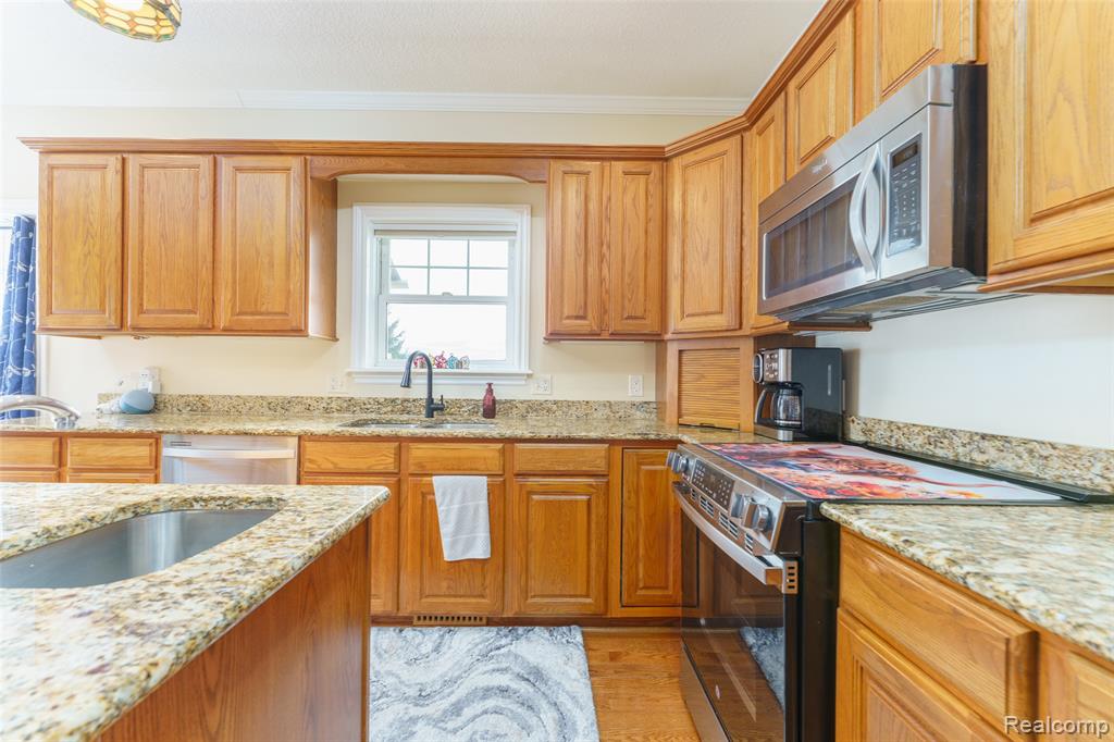 4695 Emerald Valley Loop, Fowlerville, MI 48836 — Photo 13