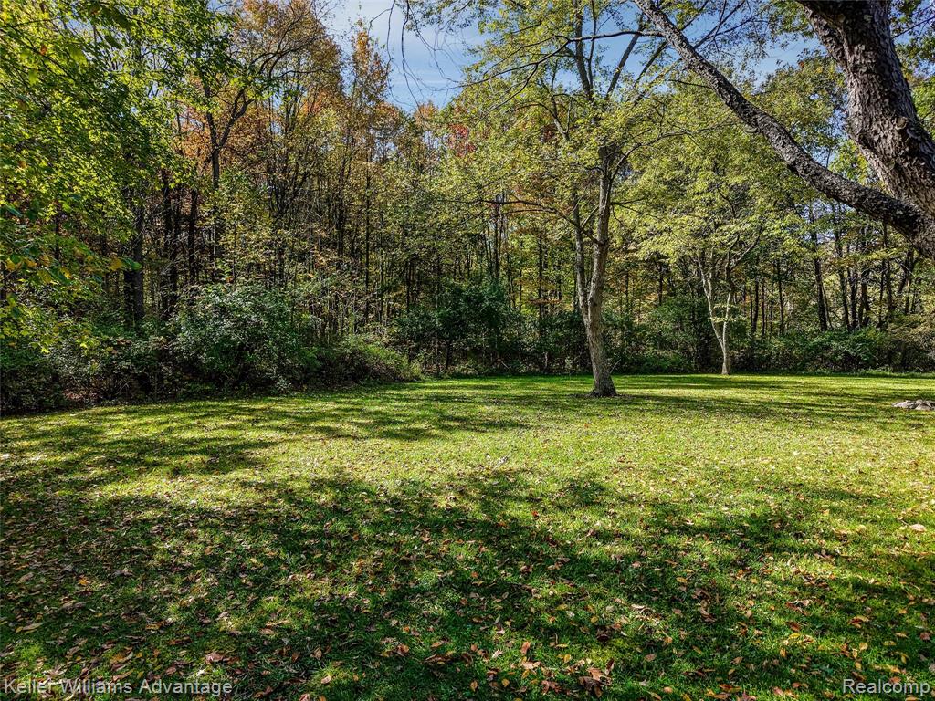 5480 Lyngre Drive, Howell, MI 48843 — Photo 49