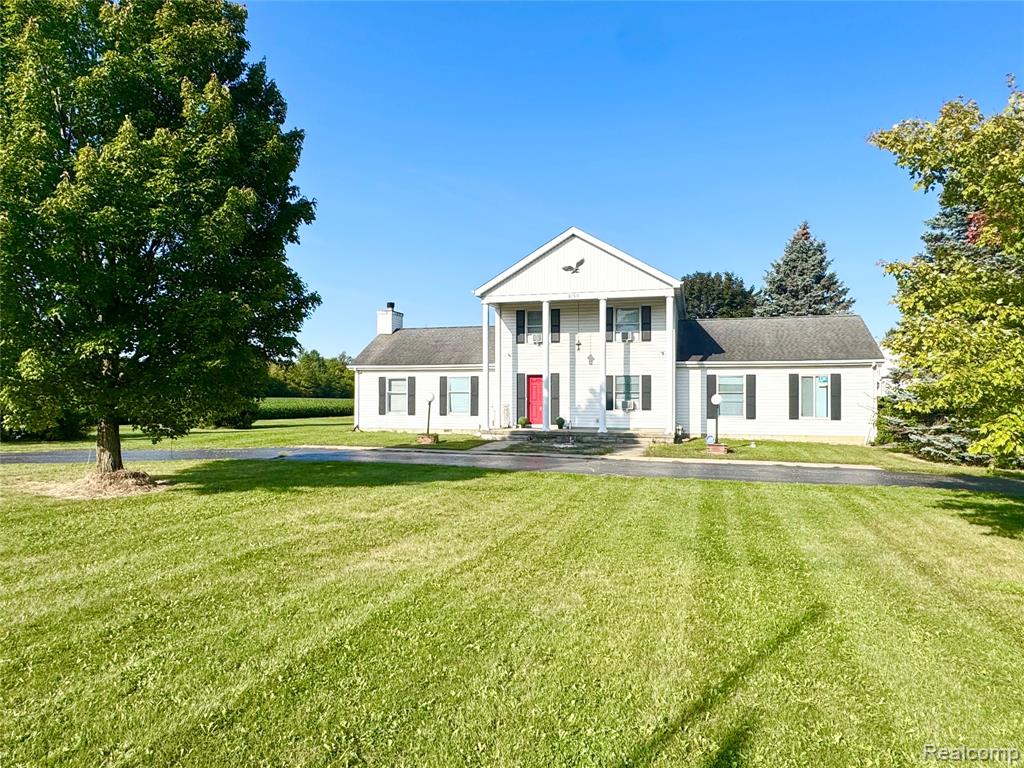 8760 Carpenter Road, Milan, MI 48160 — front exterior