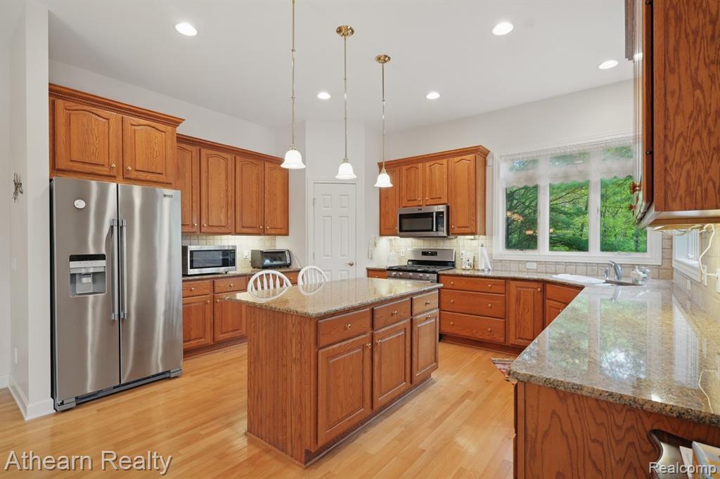 8373 Riverwalk Drive, Fenton, MI 48430 — Photo 39