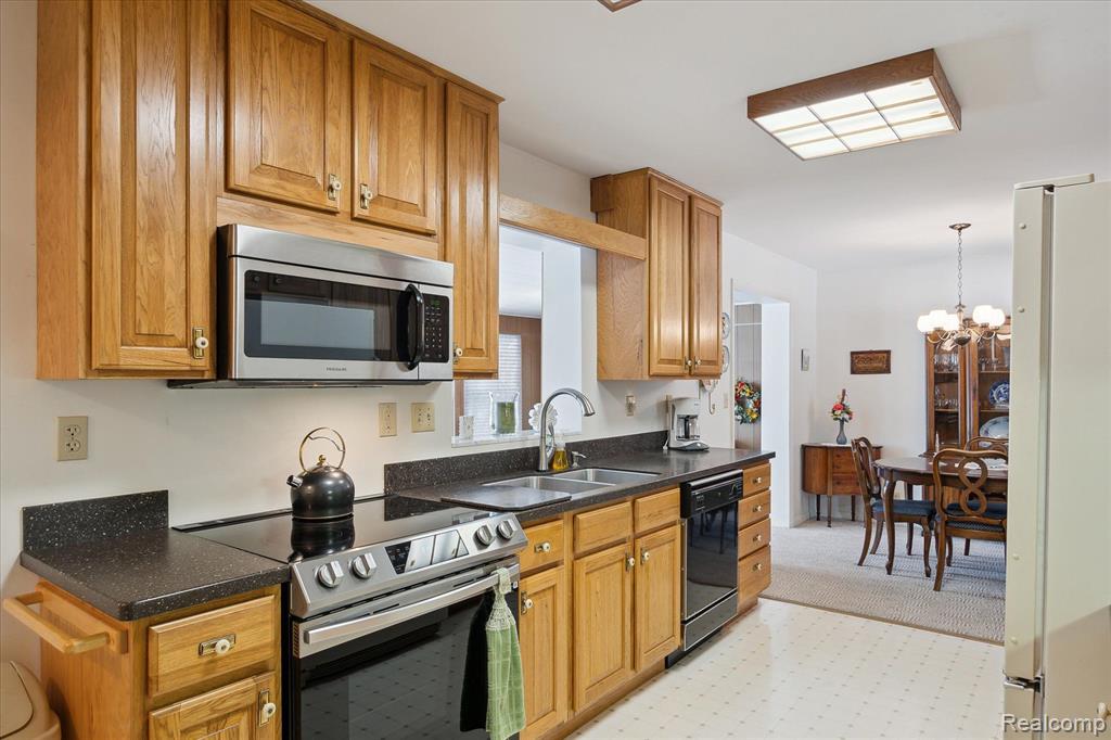 310 TAYLOR Lane, Chelsea, MI 48118 — Photo 14