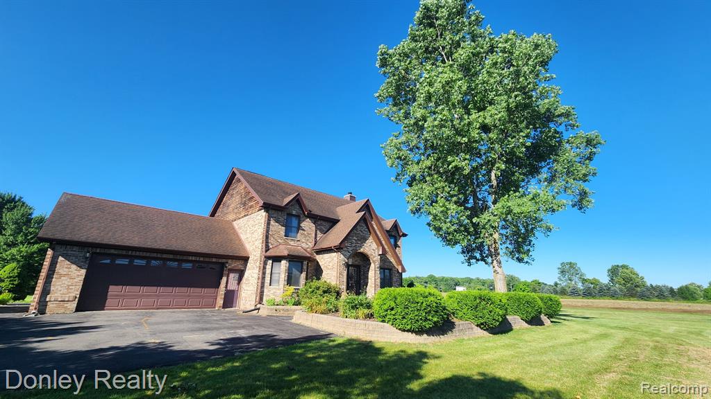 12923 Belle River Road, Riley, MI — front exterior