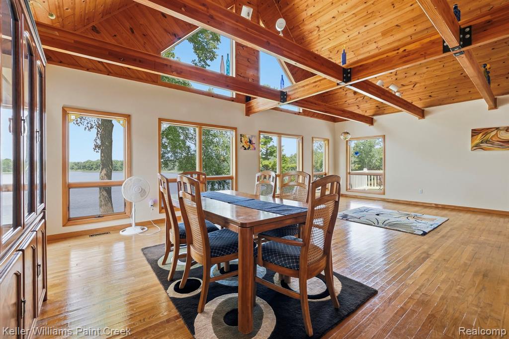 Vaulted wood-paneled ceiling with exposed beams