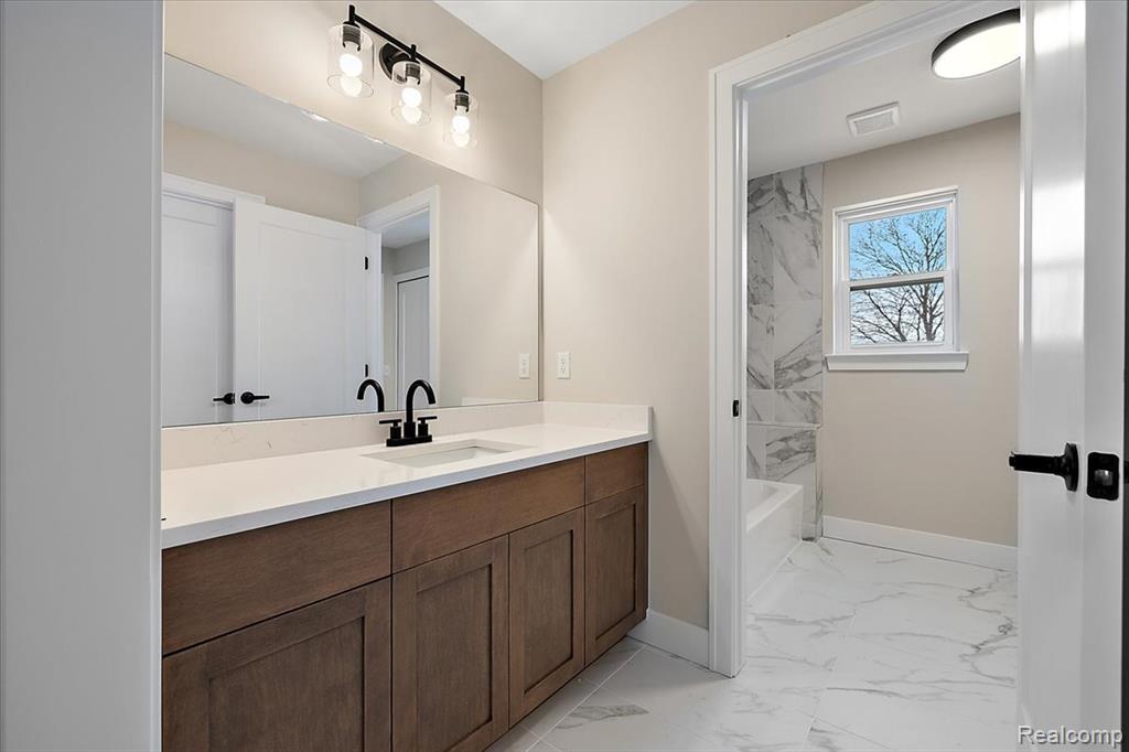 Full bath with vanity, and bathing tub / shower combination