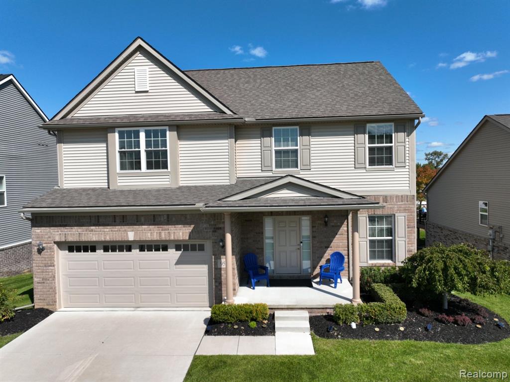 951 N Mill Street, South Lyon, MI 48178 — front exterior