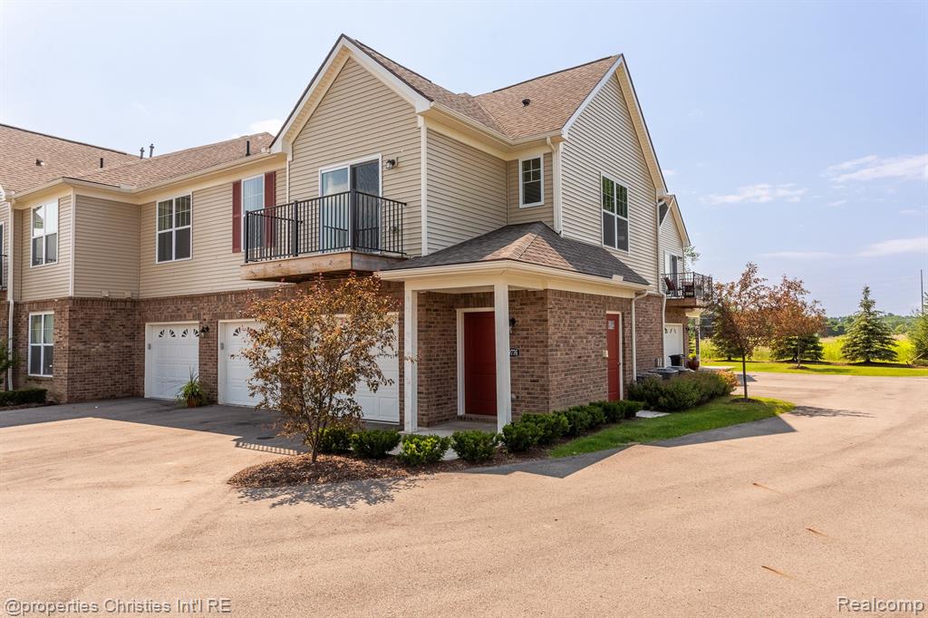 9776 RIDGE RUN Street, Howell, MI 48855 — front exterior