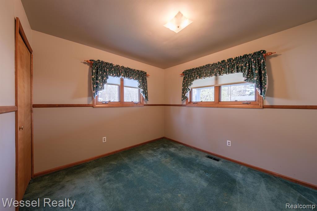 557 Green Cove Drive, Holly, MI 48442 — Photo 16