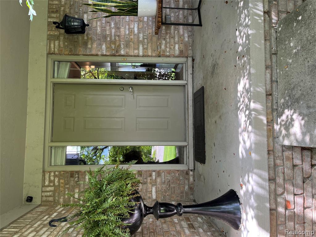 5872 Three Ponds Court, West Bloomfield, MI 48324 — front exterior