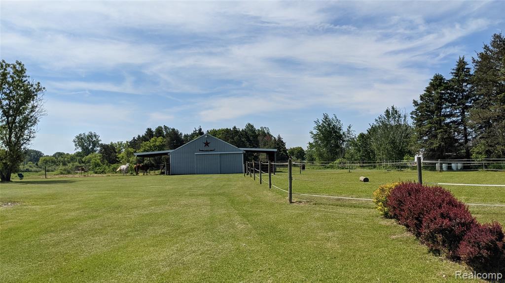 9753 W Coon Lake Road, Webberville, MI 48892 — Photo 52
