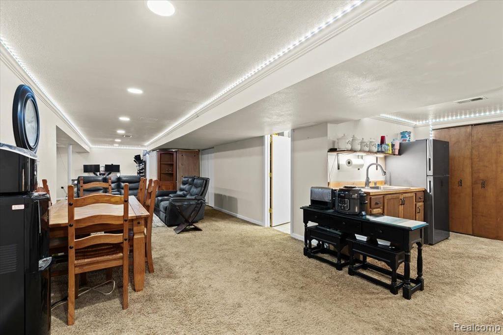 7677 MCCLEMENTS Road, Brighton, MI 48114 — Photo 16