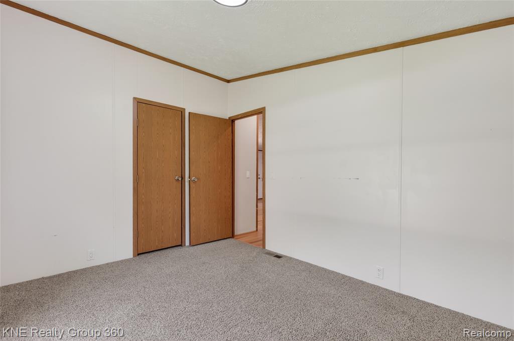 672 Red Oaks Drive, Howell, MI 48843 — Photo 28