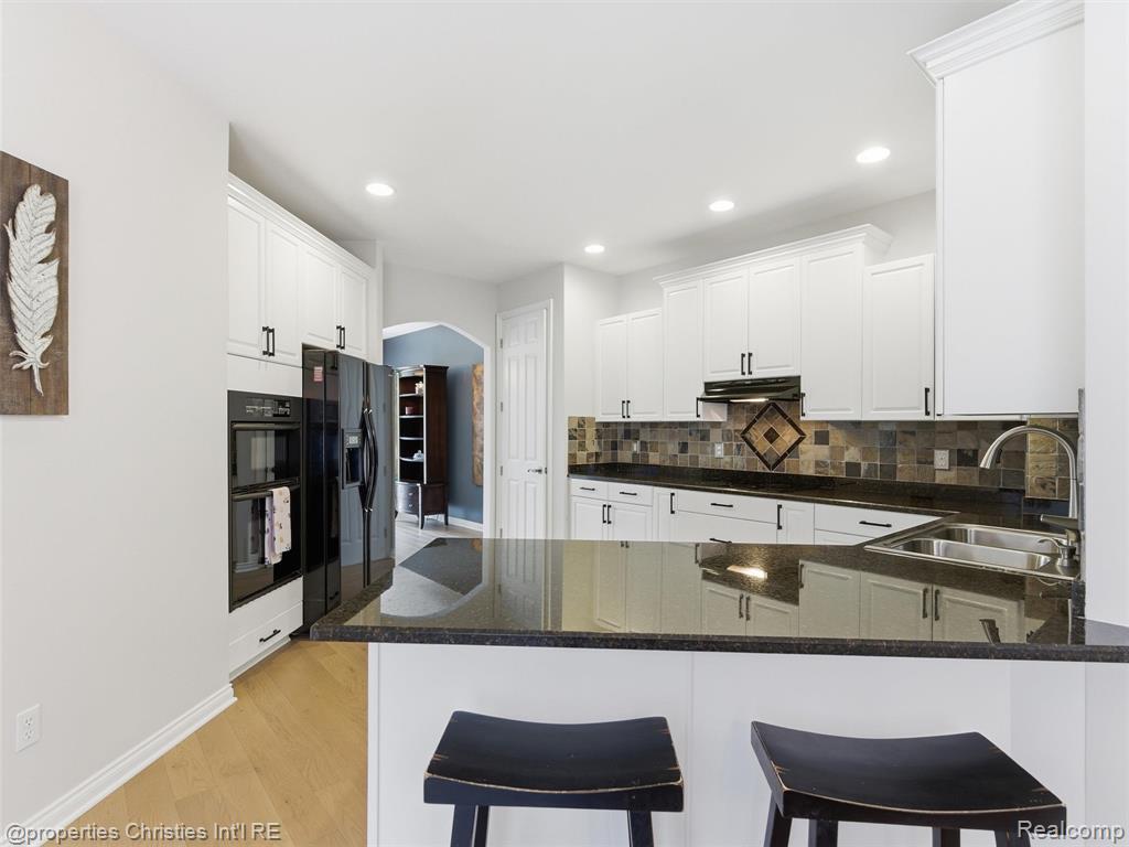 10822 Sparkling Waters Court, South Lyon, MI 48178 — Photo 21
