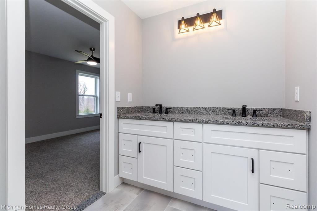 2910 LOON Drive, Wixom, MI 48393 — Photo 43