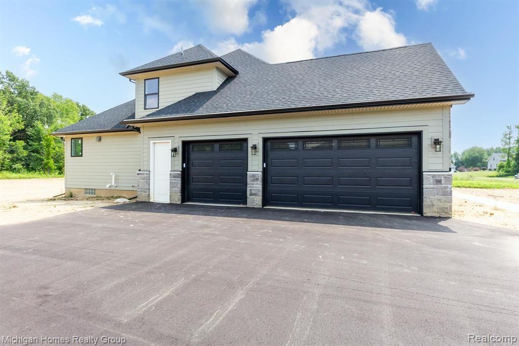 2910 LOON Drive, Wixom, MI 48393 — Photo 82
