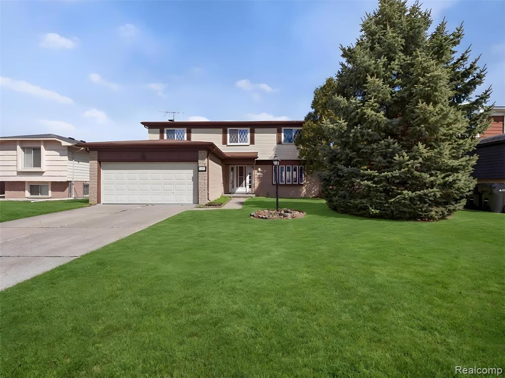 4667 Bloomfield Drive, Sterling Heights, MI 48310 — front exterior