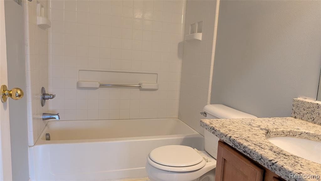413 VILLAGE Drive, Walled Lake, MI 48390 — Photo 28