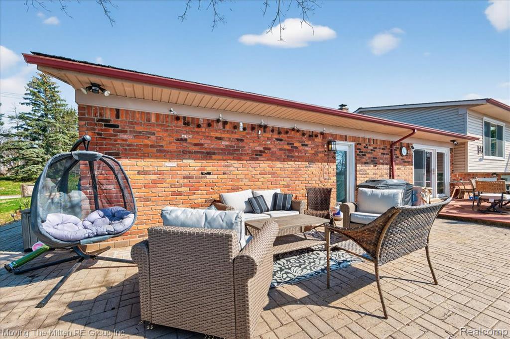 View of patio with an outdoor living / dining area