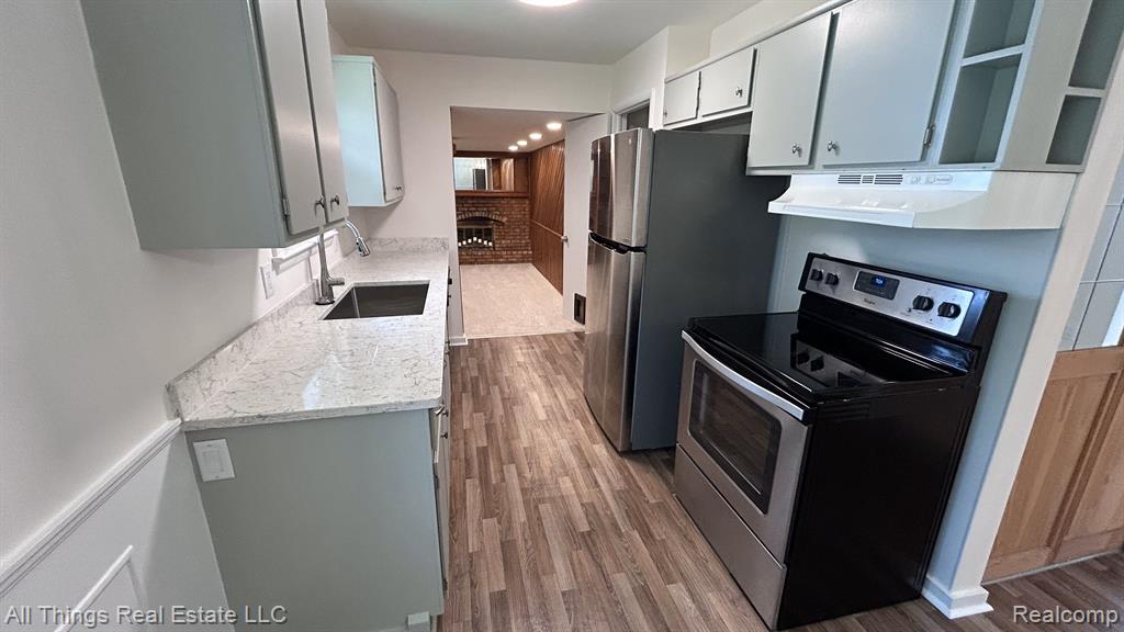 6037 BROOKWOOD Drive, Burton, MI 48509 — Photo 5