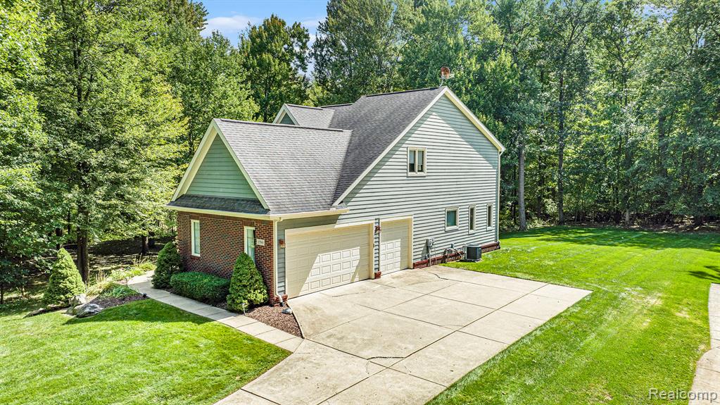 1799 Elkridge Circle, Highland, MI 48356 — Photo 4