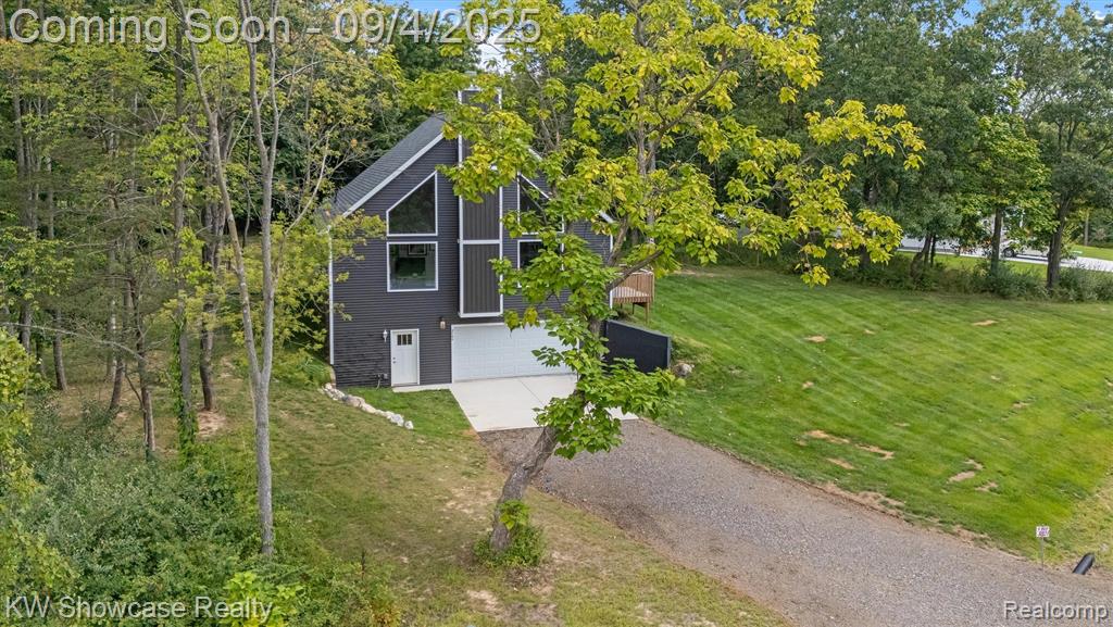 9760 Copper Ridge Drive, Fowlerville, MI 48836 — Photo 3