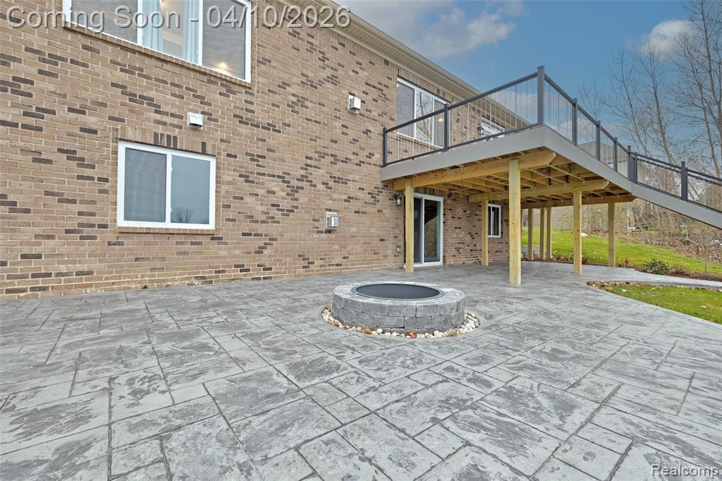View of patio / terrace featuring a fire pit