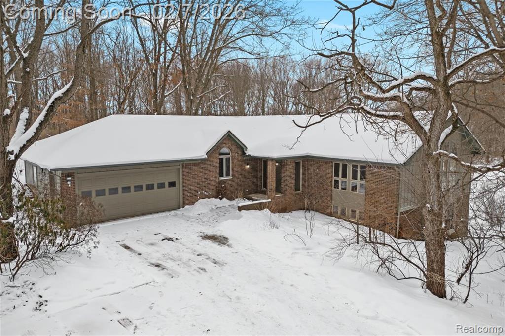 411 Rush Lake Road, Pinckney, MI 48169 — front exterior