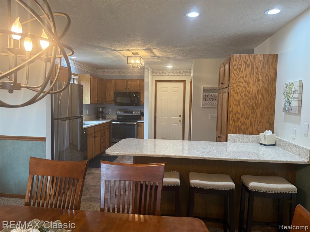 5855 Caleta Drive, Lansing, MI 48911 — Photo 9