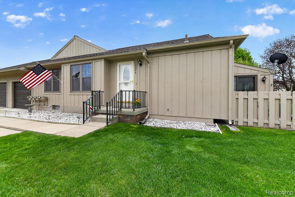 10044 Arlington Circle, 145, South Lyon, MI 48178 — front exterior