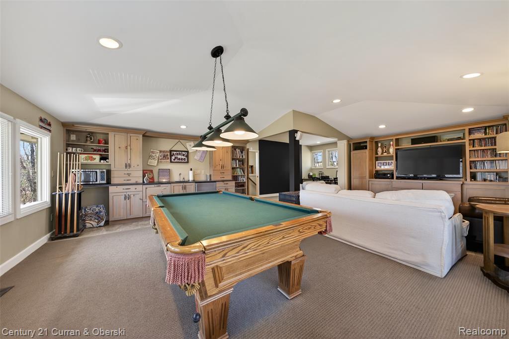 Rec room featuring recessed lighting, wet bar, carpet, pool table, and plenty of natural light