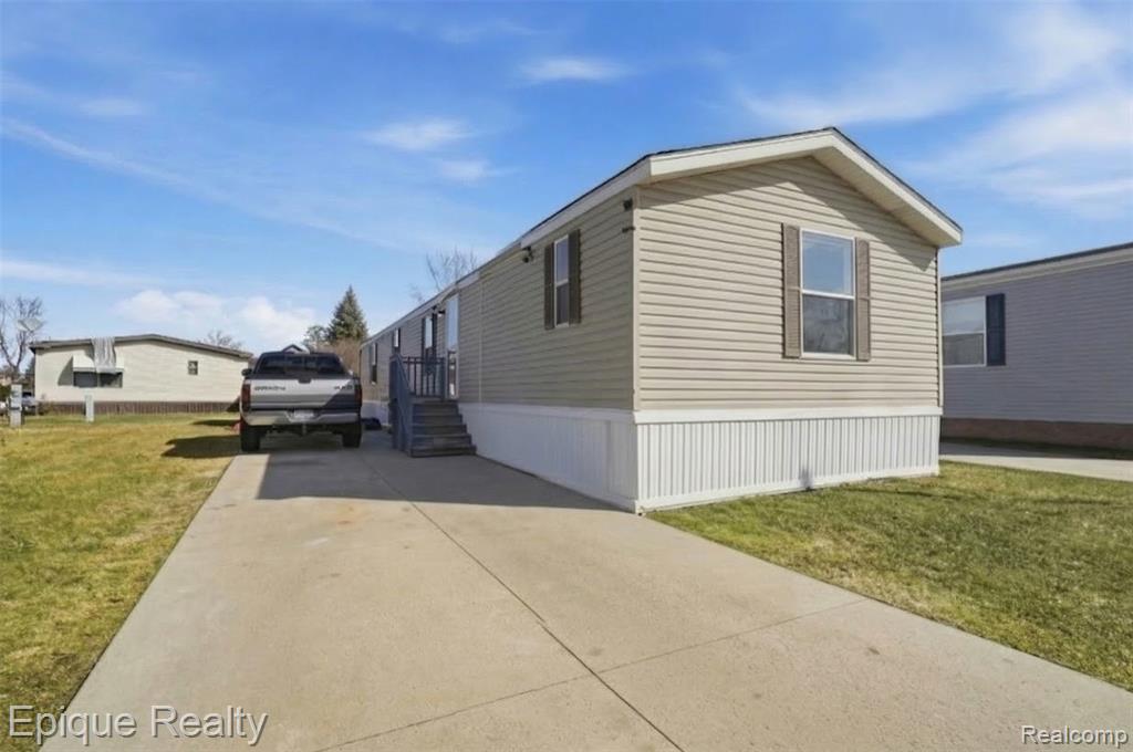 15317 Cartier Drive, Clinton Twp, MI 48038 — front exterior