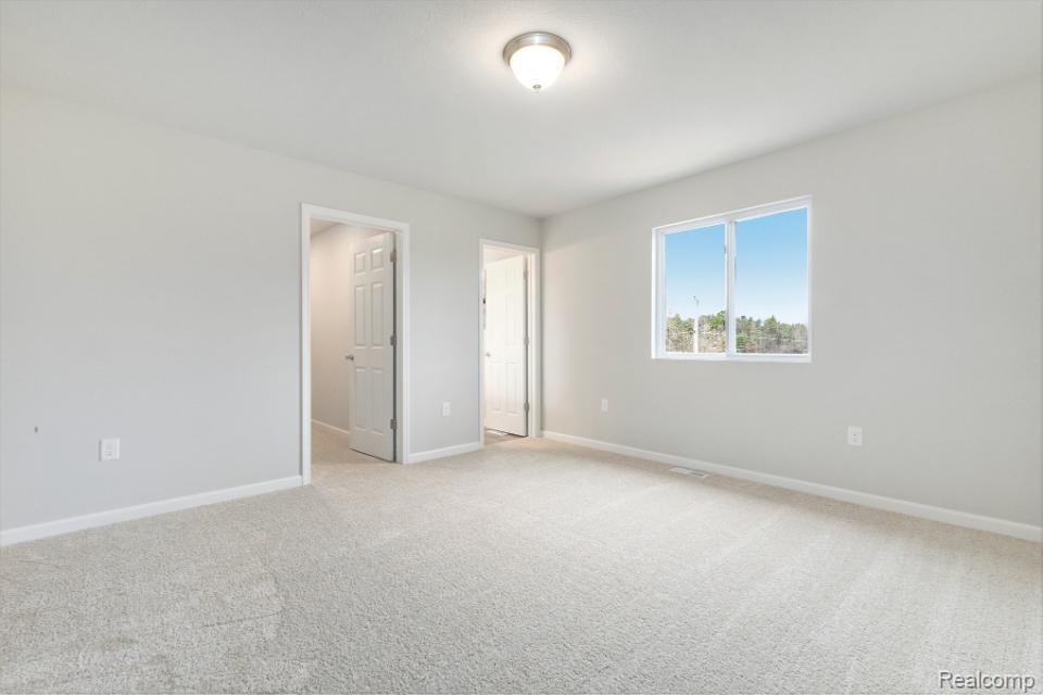 8185 Moonlight Creek Lane, Fowlerville, MI 48836 — Photo 21