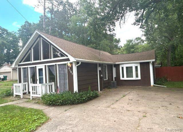 9151 CHAUMONT Drive, Commerce Twp, MI 48382 — front exterior