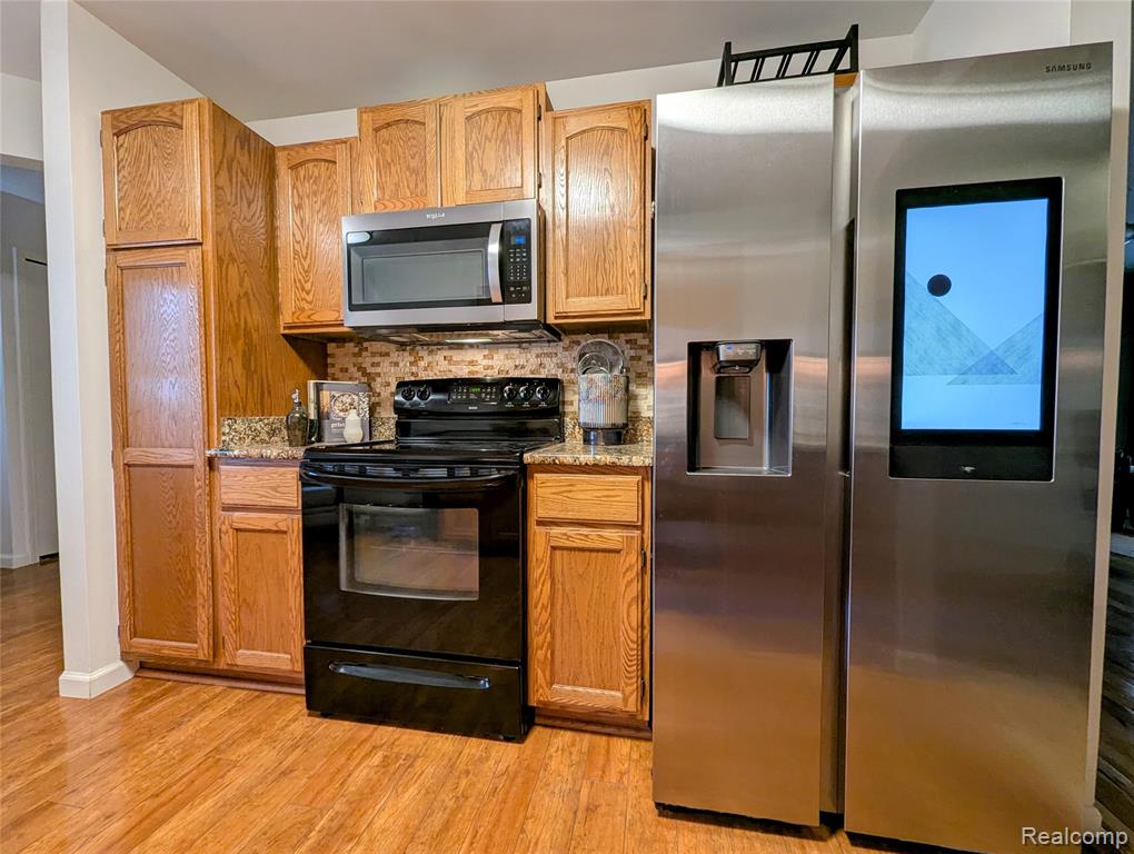 840 Woodridge Hills Drive, Brighton, MI 48116 — Photo 39
