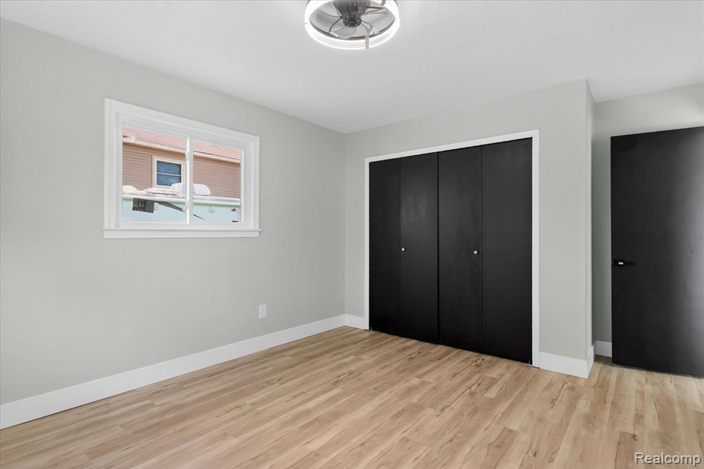677 Lucille Drive, Wolverine Lake, MI 48390 — Photo 20