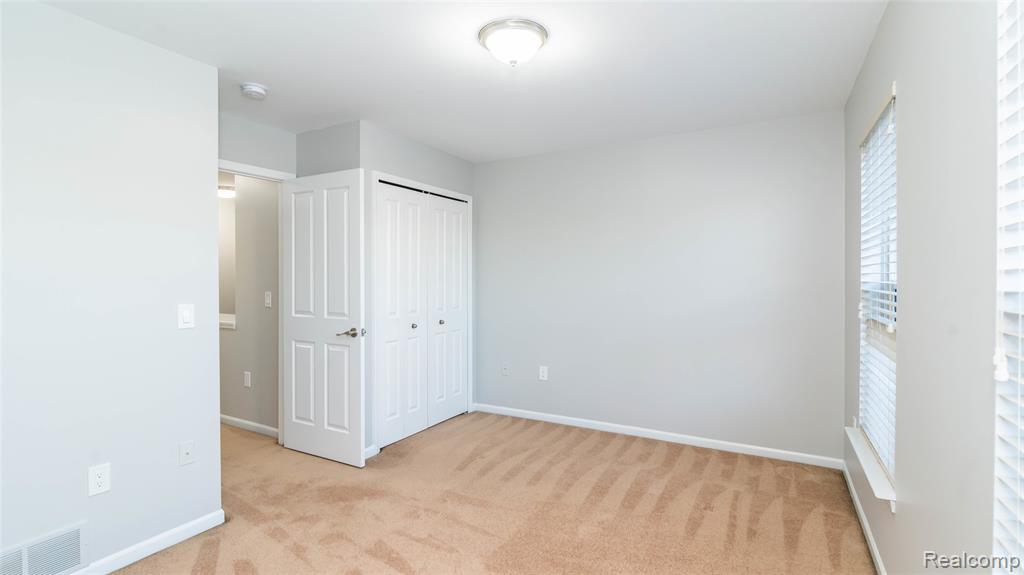 6114 Heron Hills Drive, Wolverine Lake, MI 48390 — Photo 34